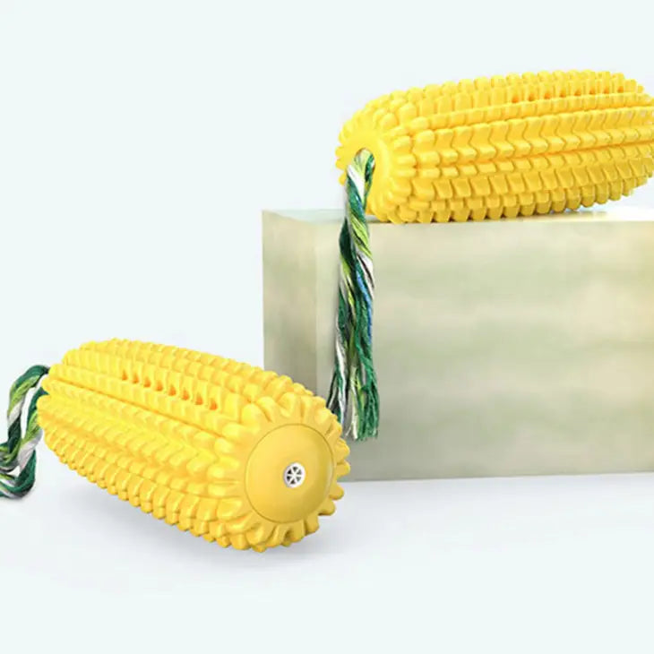 Two corn cob toothbrush cleaning dog chew toys in yellow with green and white tassels by JSBlueRidge Toys