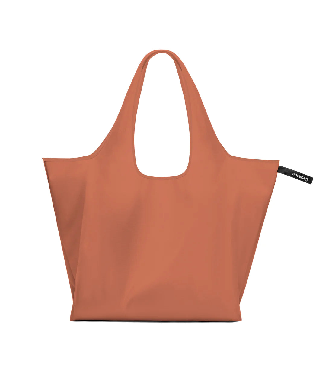 Notabag Foldable reusable backpack/tote in terracotta unfolded as a tote bag