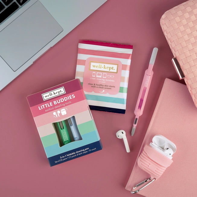 Litte Buddies Earbud Cleaning Kit by Stay Well Kept tech wipes and 3-1 pen in front of laptop computer