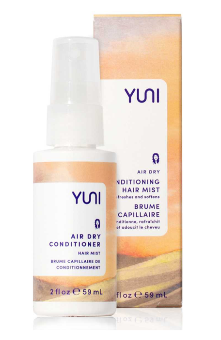 Spray bottle 2fl oz of Yuni Air Dry Conditioner hair mist with box in background